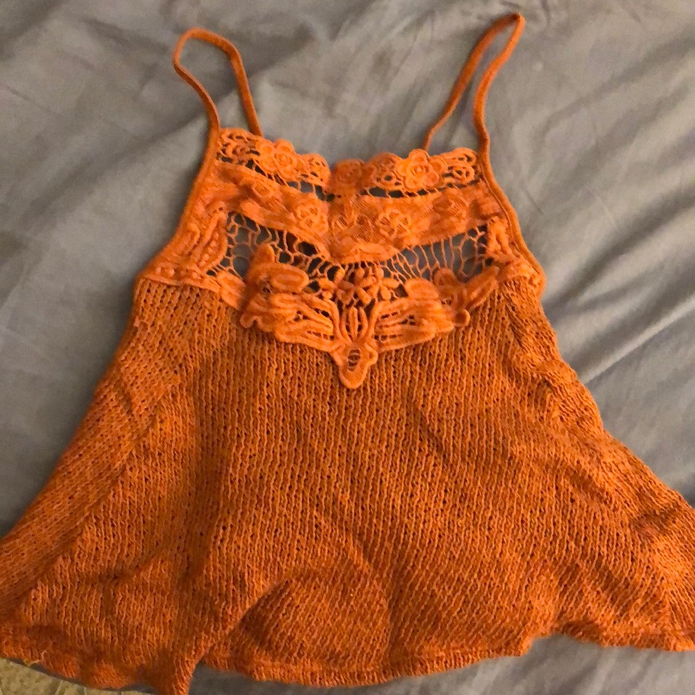 Orange sleeveless shirt
